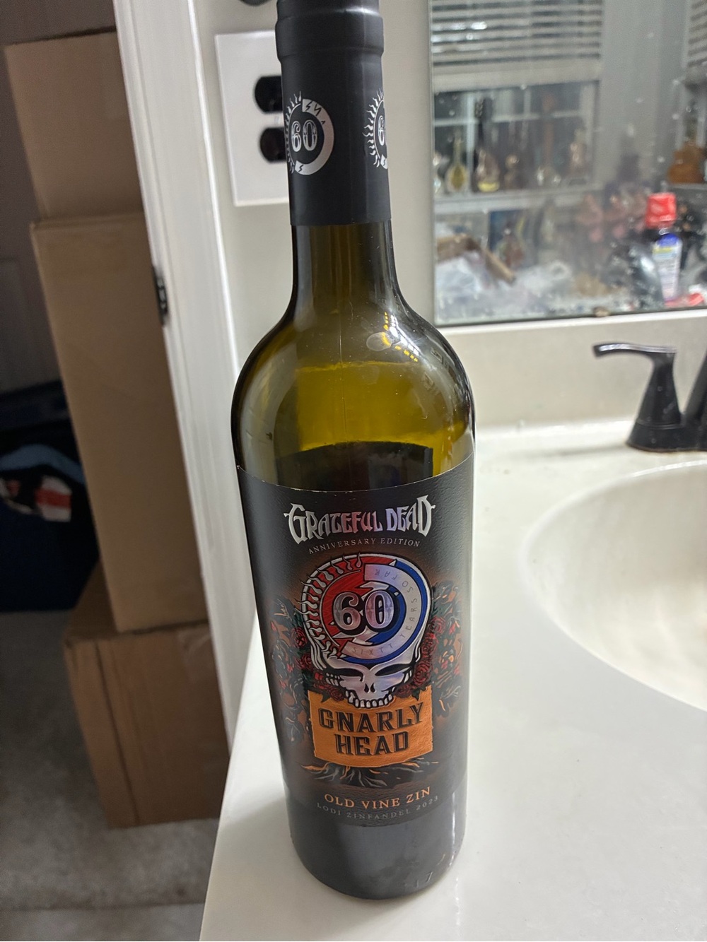 Grateful Dead Black Label Bottle with Red and Blue Skull Artwork